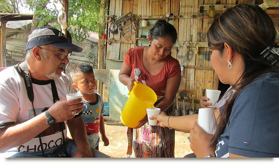 Sharing a homemade fresco - Guatemala