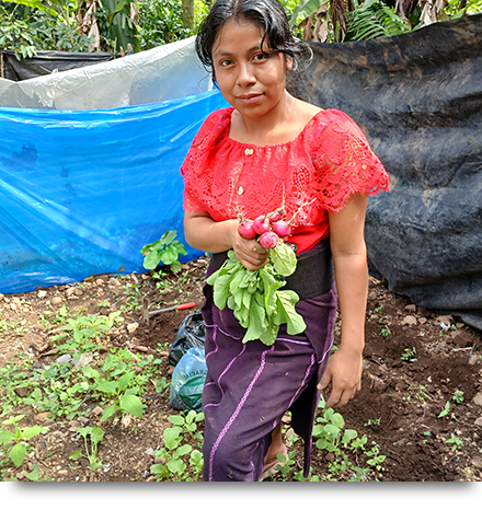 Participant Mother in Her Thriving Garden