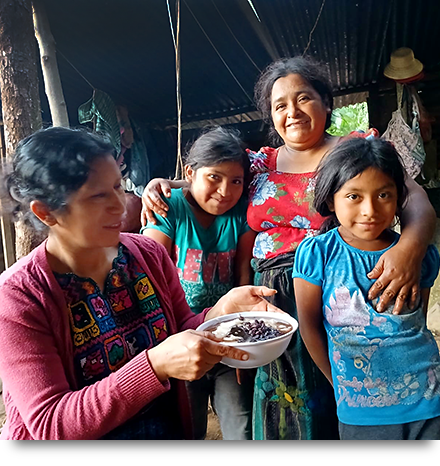 Participants with Team Member and Food from their Garden